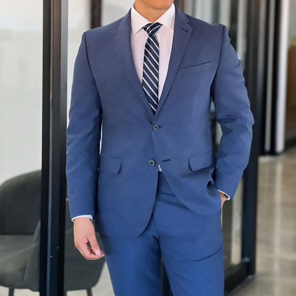 Photo of a man wearing a tuxedo