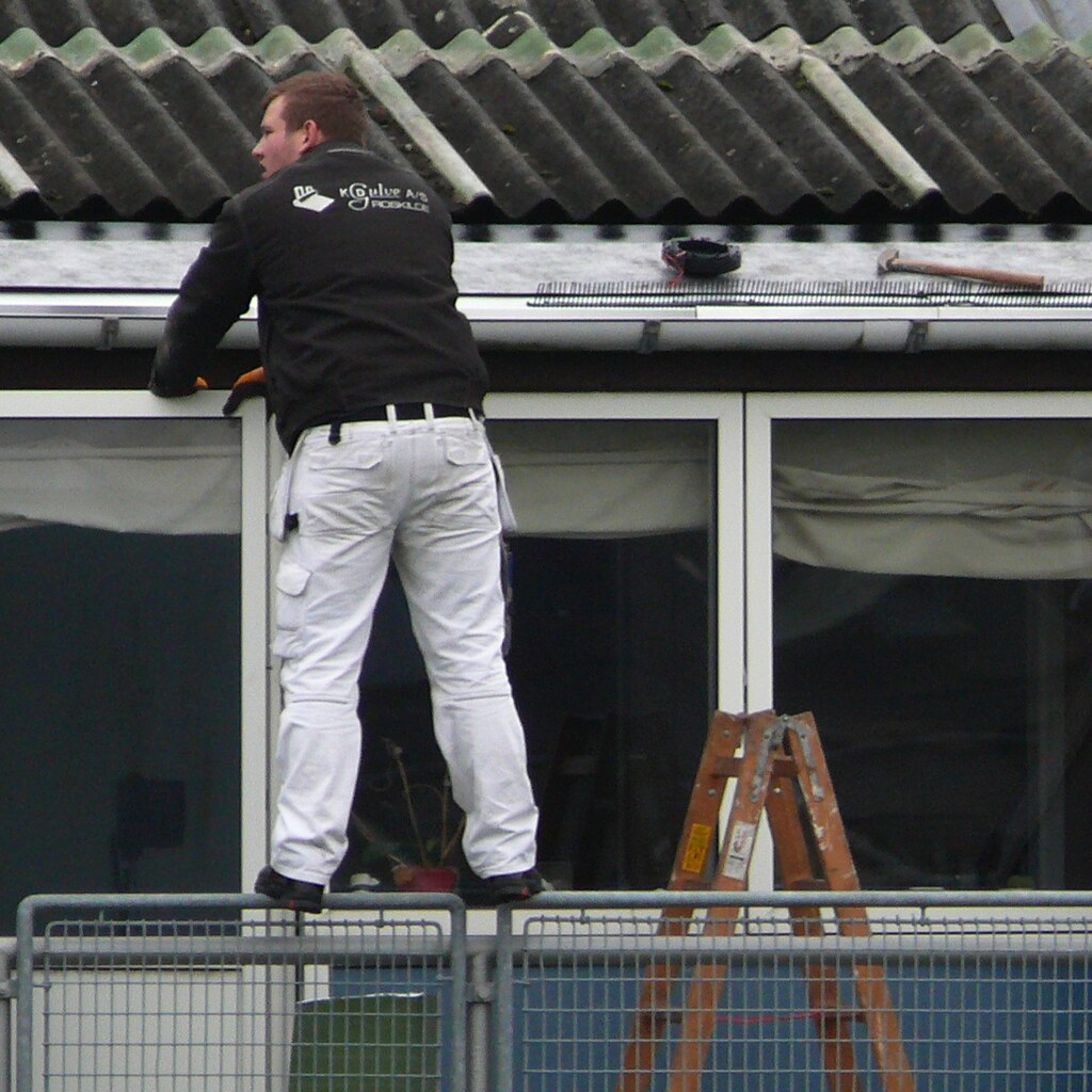 Photo of a man doing something unsafe