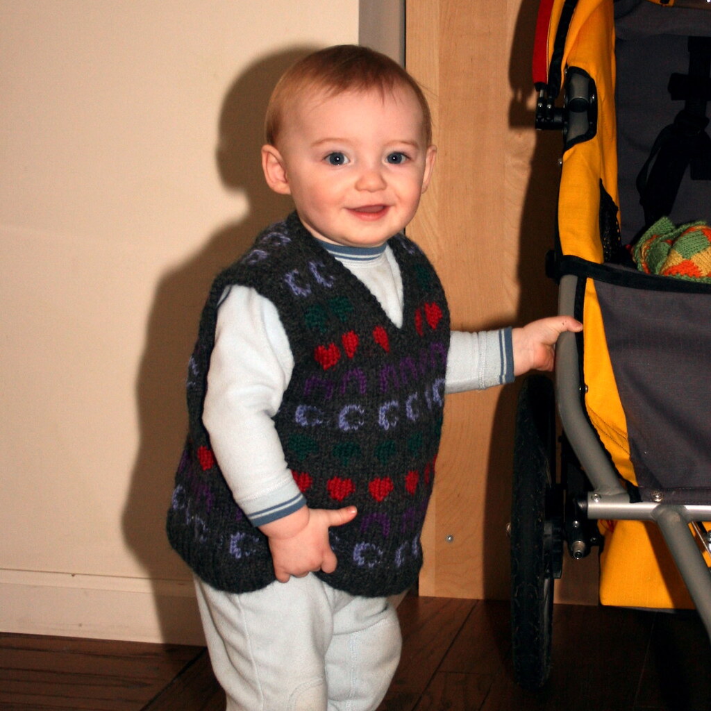 Photo of a baby wearing a vest