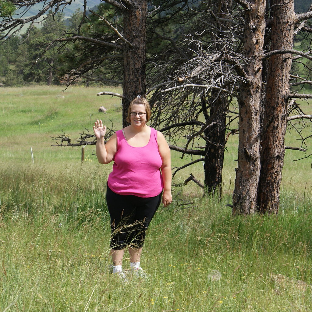 Photo of a woman waving