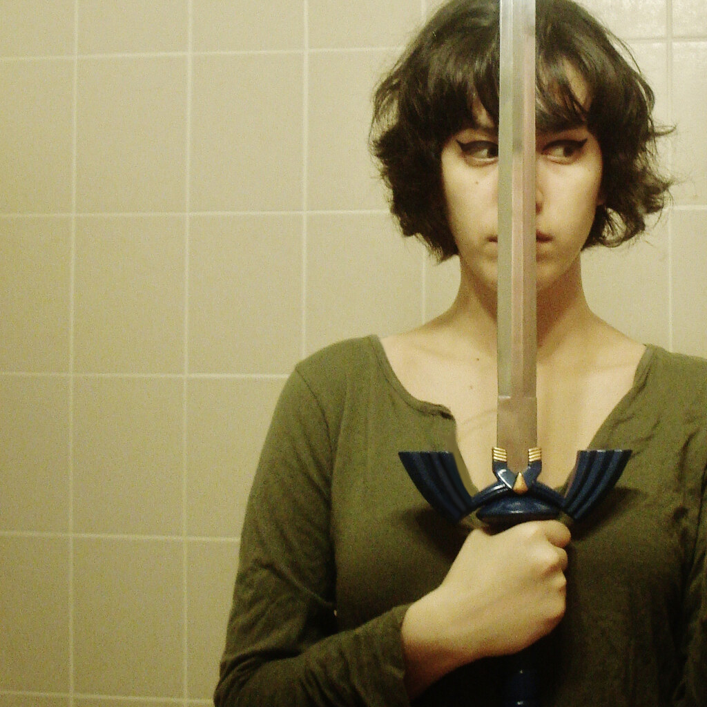 Photo of someone wielding a sword