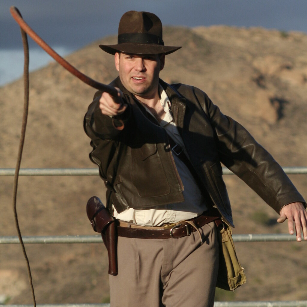 Photo of a man cracking a whip
