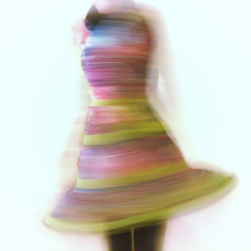 Photo of a woman whirling around