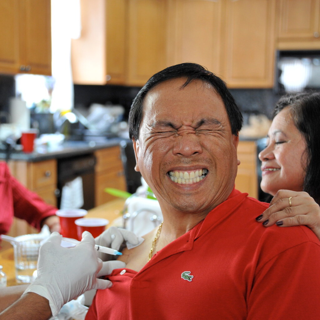 Photo of a man wincing
