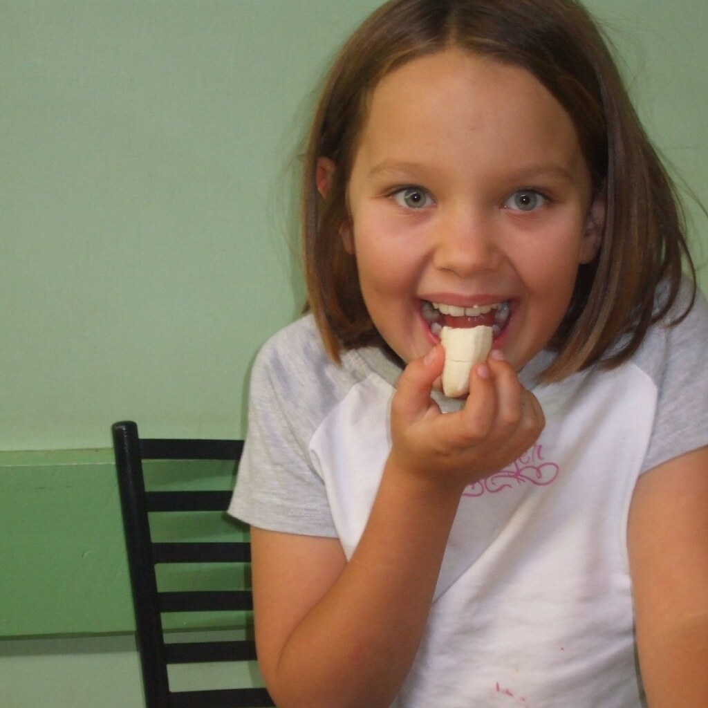 Photo of a child eating yummy food